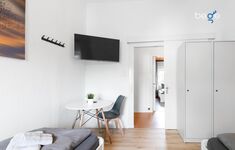 Schlafzimmer 3 mit zwei Einzelbetten, Sitzecke und Smart TV