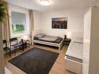Monteurwohnung Essen | WLAN, Küche, Parkplätze, Einzelbetten Bild 3