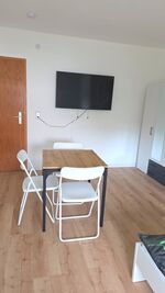 Schlafzimmer mit Fernseher