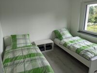 Kernsanierte neu möblierte EG-Wohnung, 4 DZ mit Einzelbetten Bild 4