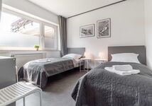 Schlafzimmer mit 2 Einzelbetten und Smart-TV