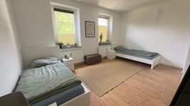 Schlafzimmer mit 2 Betten