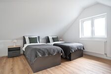Modern eingerichtete Studios mit voll ausgestatteter Küche Bild 11