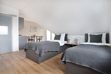 Modern eingerichtete Studios mit voll ausgestatteter Küche Bild 7