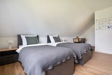 Modern eingerichtete Studios mit voll ausgestatteter Küche Bild 17