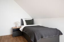 Modern eingerichtete Studios mit voll ausgestatteter Küche Bild 27