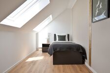 Modern eingerichtete Studios mit voll ausgestatteter Küche Bild 29