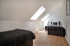 Modern eingerichtete Studios mit voll ausgestatteter Küche Bild 30