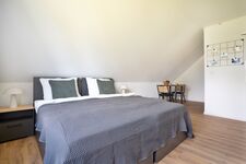 Modern eingerichtete Studios mit voll ausgestatteter Küche Bild 15