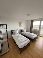 Monteurs Unterkunft über den Dächern der Stadt Bild 6