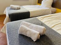 Workers Lodge 4-14 Pers. 2 App., Einzelbetten, Parkplatz Bild 8