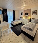 Schlafzimmer mit Balkon