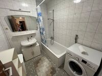 Badezimmer mit Waschmaschine