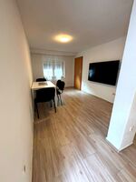 Esszimmer mit Fernseher