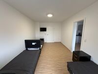 LETA Homes - Monteurzimmerwohnung - Einzigartige Lage Bild 1