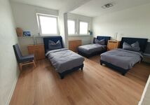 Schlafzimmer 1 mit 3 Einzelbetten