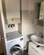 Wohnung 1: Bad mit Waschmaschine