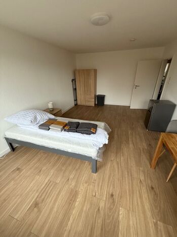 Einzelzimmer mit Kühlschrank