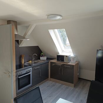 Wohn-Esszimmer mit Küche