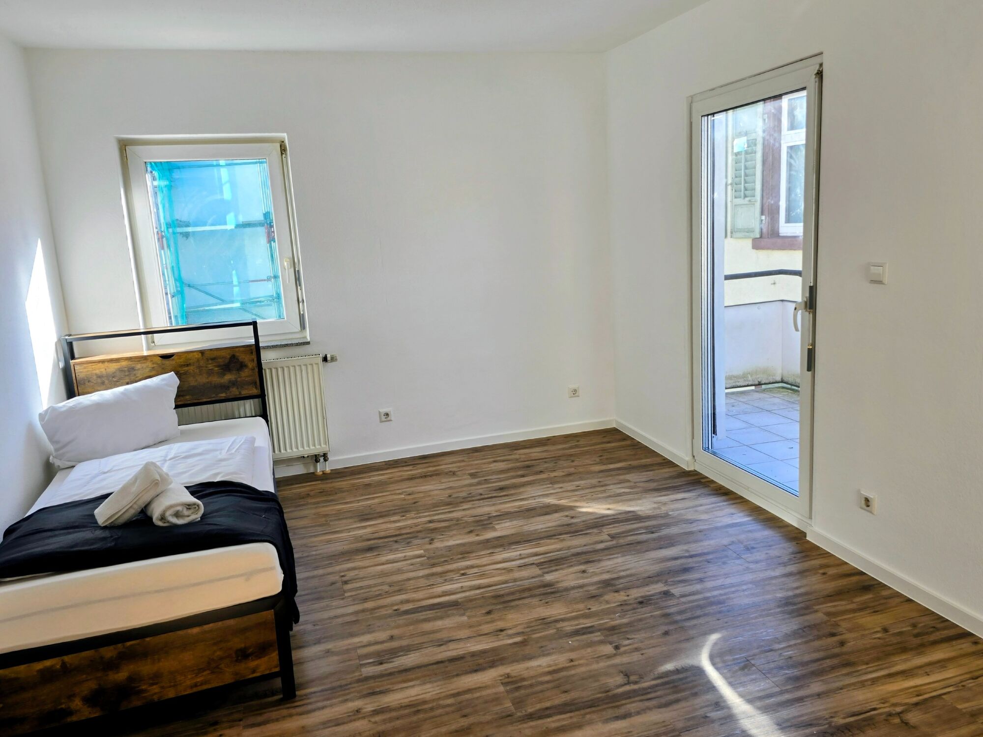 Schlafzimmer mit Balkon