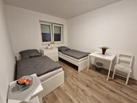 Monteurwohnung RoomWork24 – 10 Betten | Parkplatz Bild 18