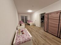 Monteurwohnung RoomWork24 – 10 Betten | Parkplatz Bild 19