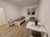 Monteurwohnung RoomWork24 – 10 Betten | Parkplatz Bild 20