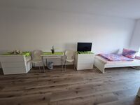 Monteurwohnung RoomWork24 – 10 Betten | Parkplatz Bild 23