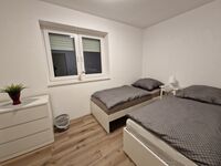 Monteurwohnung RoomWork24 – 10 Betten | Parkplatz Bild 16