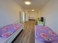 Monteurwohnung RoomWork24 – 10 Betten | Parkplatz Bild 30