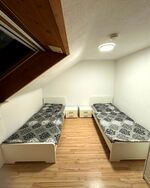 Schlafzimmer mit Einzelbetten
