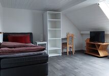 Einzelzimmer mit Boxspringbett